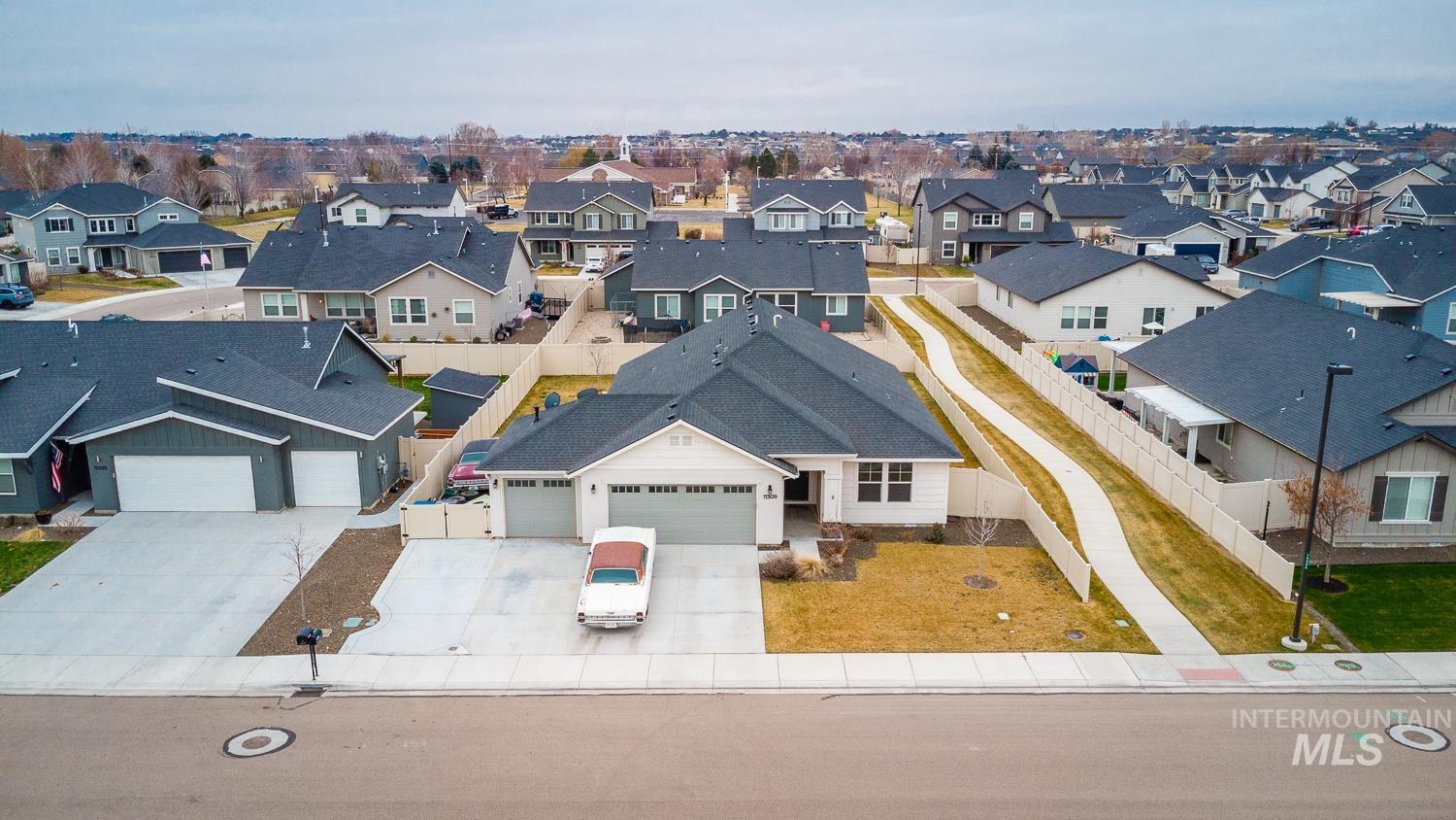 11309 West Viola Street Nampa, ID 83651 - Photo 4 of 37 Aerial perspective of suburban area