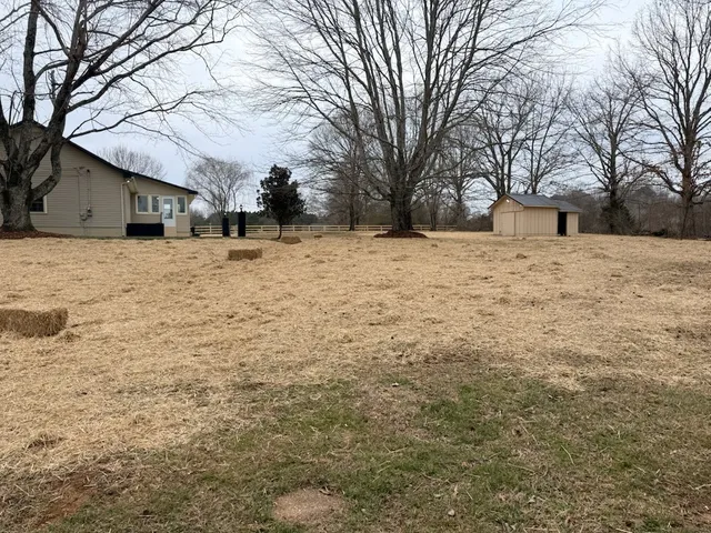 a house with trees in front of it