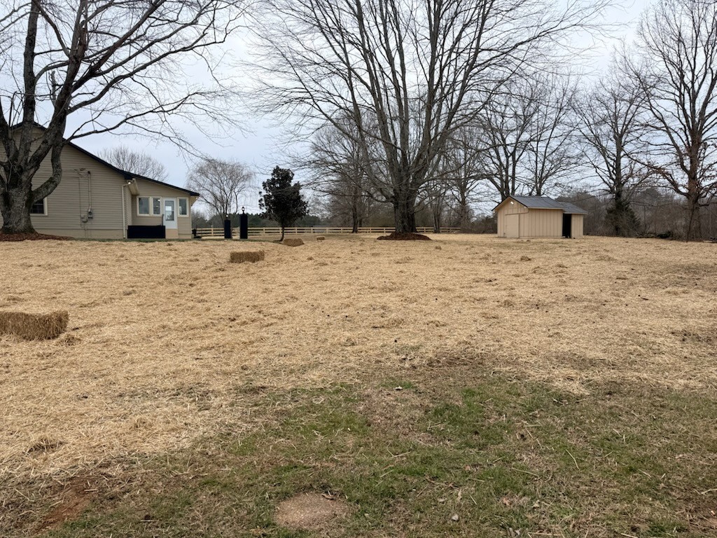 274 Howell Hill Road Kelso, TN 37348 - Photo 25 of 31 a street view covered with snow