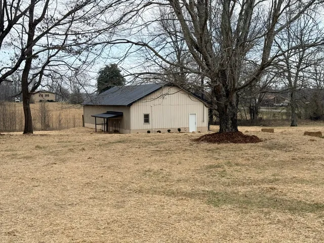 an empty room with a empty space and windows