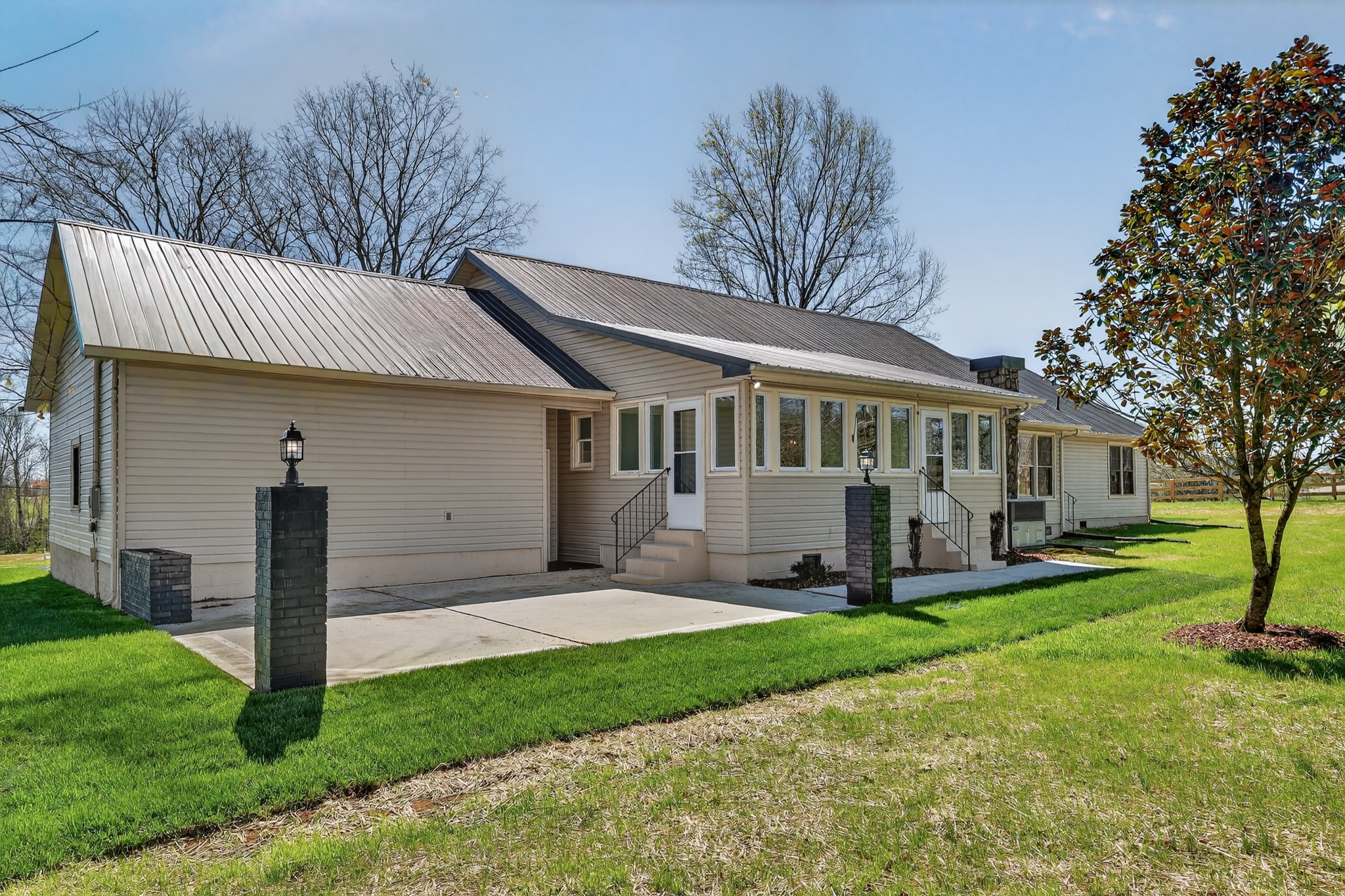 274 Howell Hill Road Kelso, TN 37348 - Photo 31 of 46 a view of a house with a yard and tree s