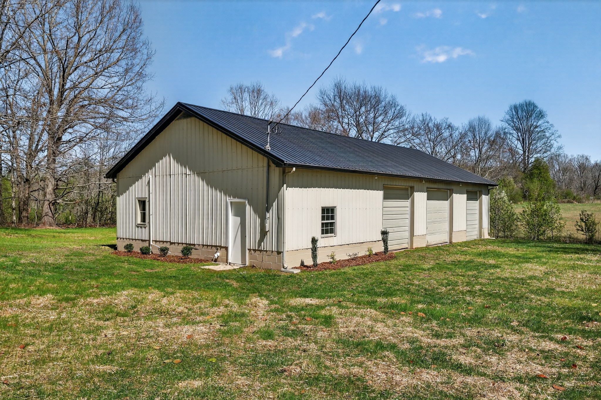 274 Howell Hill Road Kelso, TN 37348 - Photo 34 of 46 a view of a house with a yard