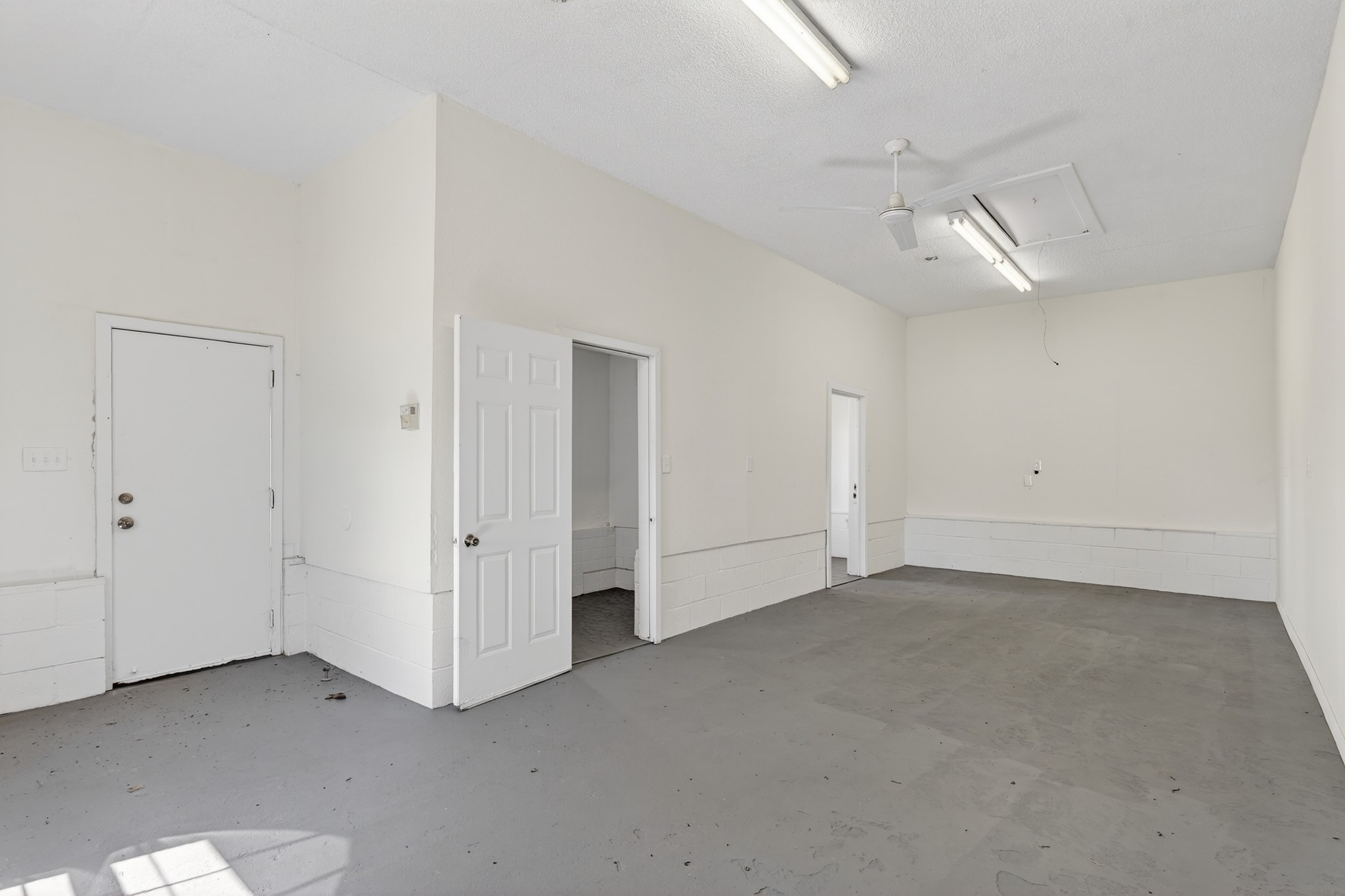 274 Howell Hill Road Kelso, TN 37348 - Photo 36 of 46 an empty room with chandelier fan