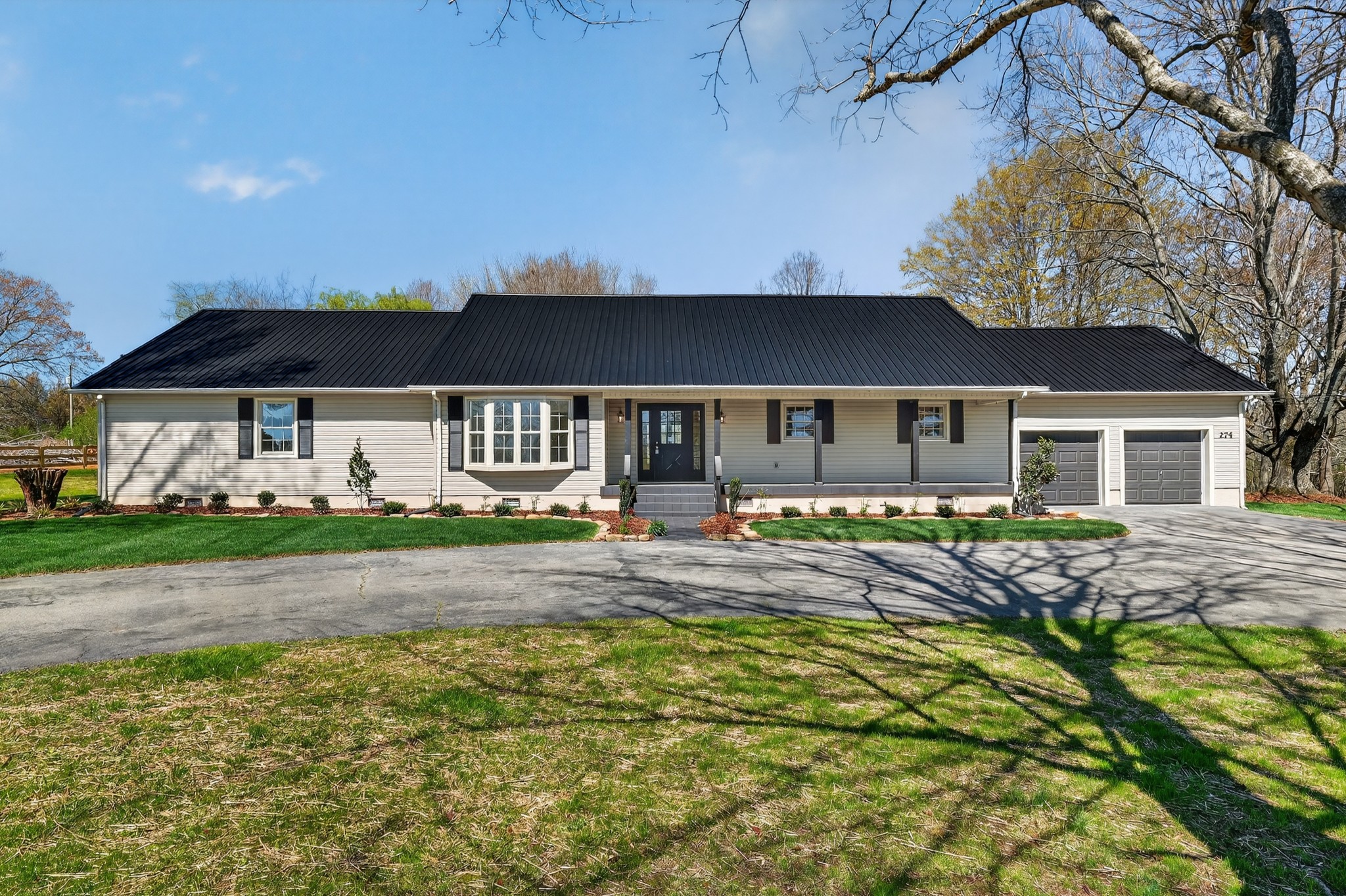 274 Howell Hill Road Kelso, TN 37348 - Photo 40 of 46 a view of house with yard and sitting area