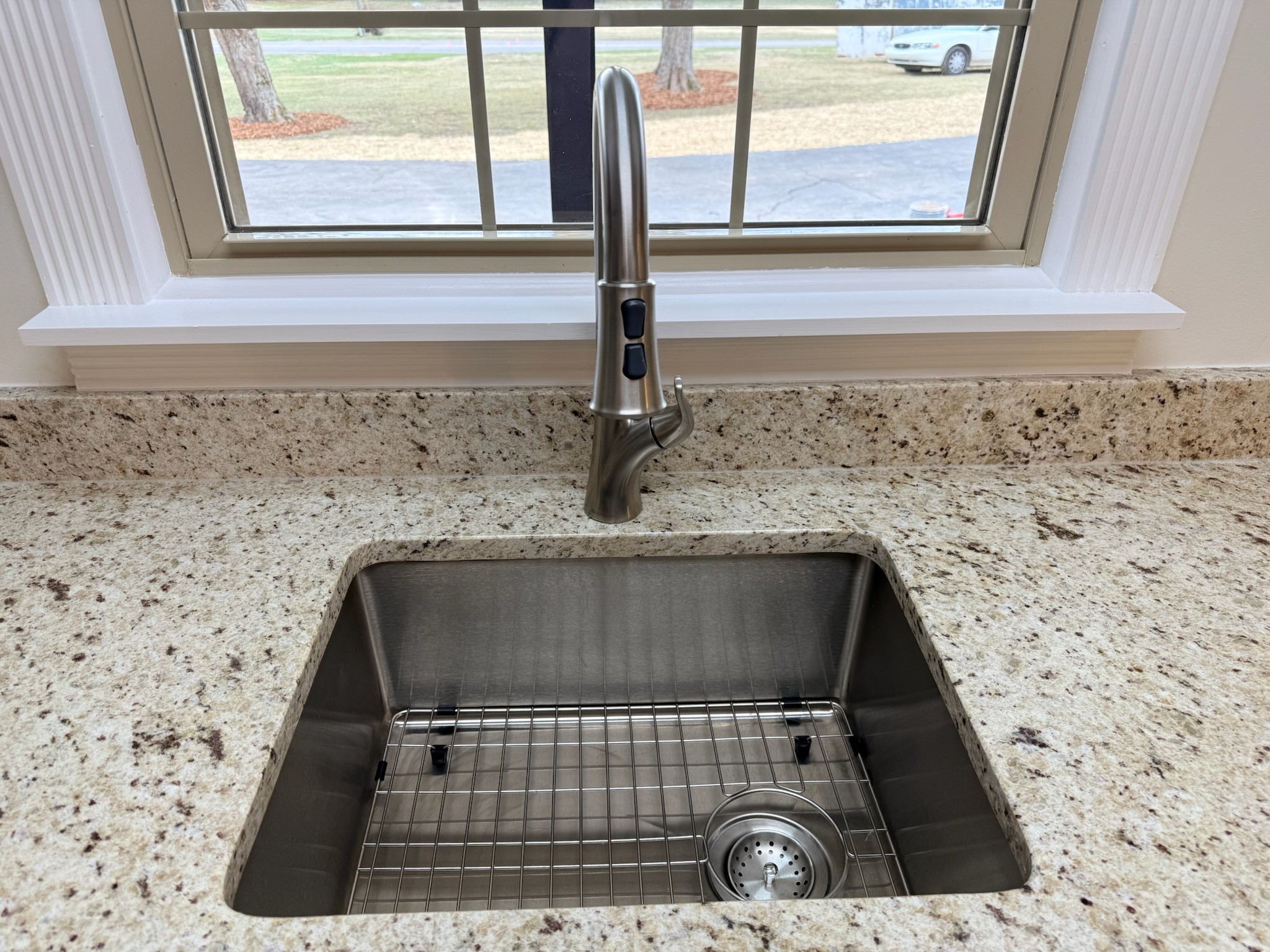 274 Howell Hill Road Kelso, TN 37348 - Photo 10 of 31 a bathroom with a granite countertop sink a window and a rug