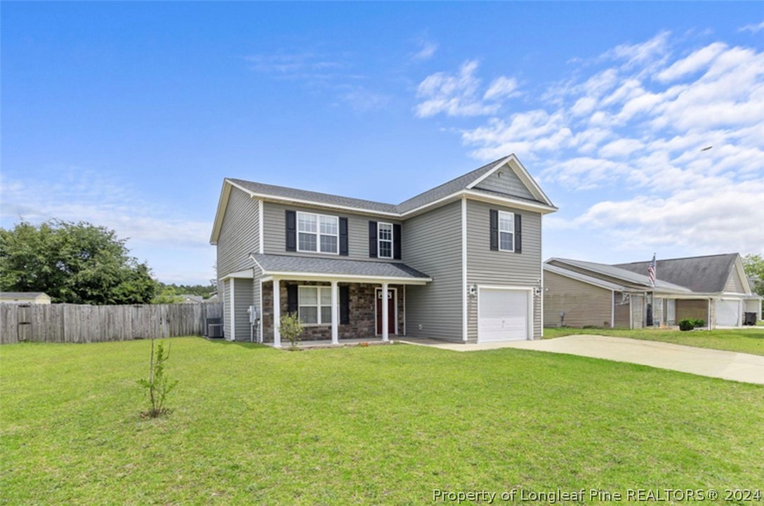 519 Cape Fear Road Raeford, NC 28376 - Photo 1 of 39 a house view with a garden space