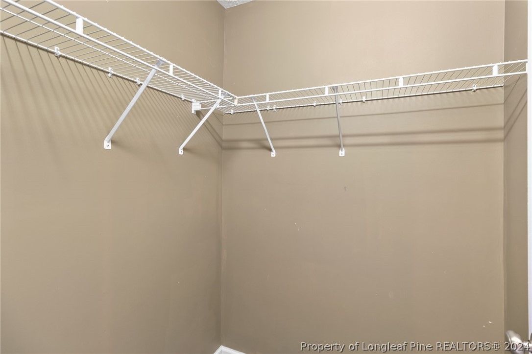 519 Cape Fear Road Raeford, NC 28376 - Photo 23 of 39 a view of a room with racks on the wall