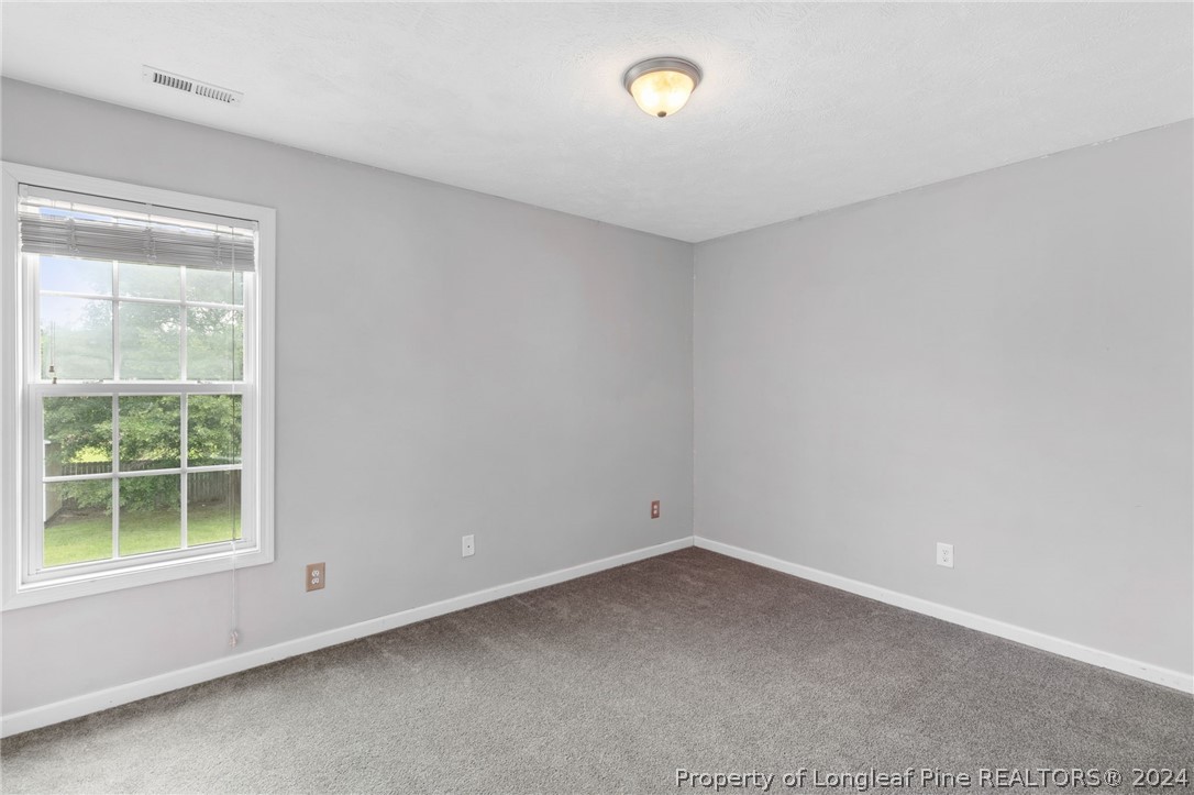 519 Cape Fear Road Raeford, NC 28376 - Photo 24 of 39 an empty room with a window