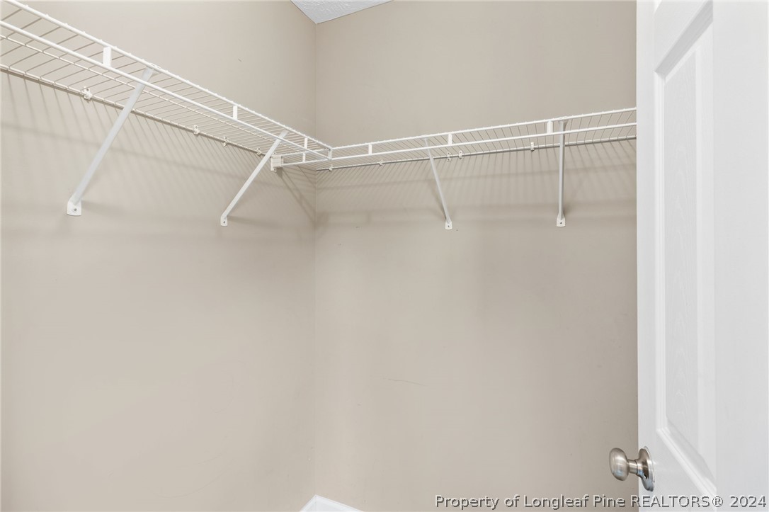 519 Cape Fear Road Raeford, NC 28376 - Photo 26 of 39 a view of a room with racks on the wall
