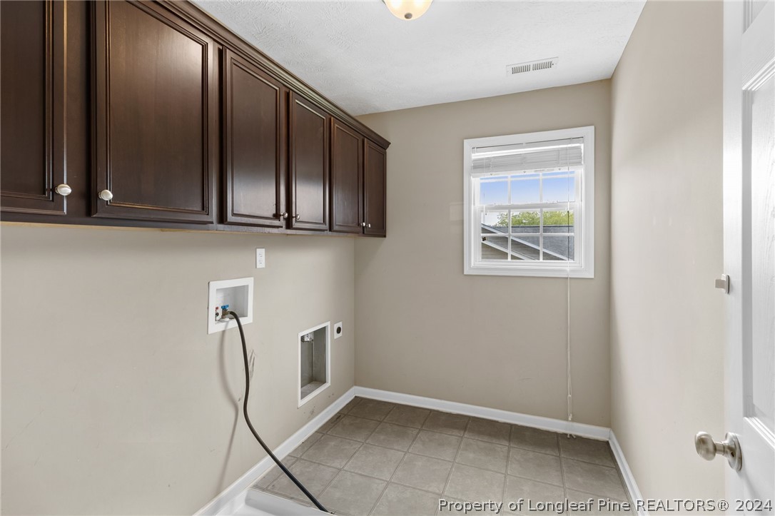 519 Cape Fear Road Raeford, NC 28376 - Photo 30 of 39 a view of a hallway with closet