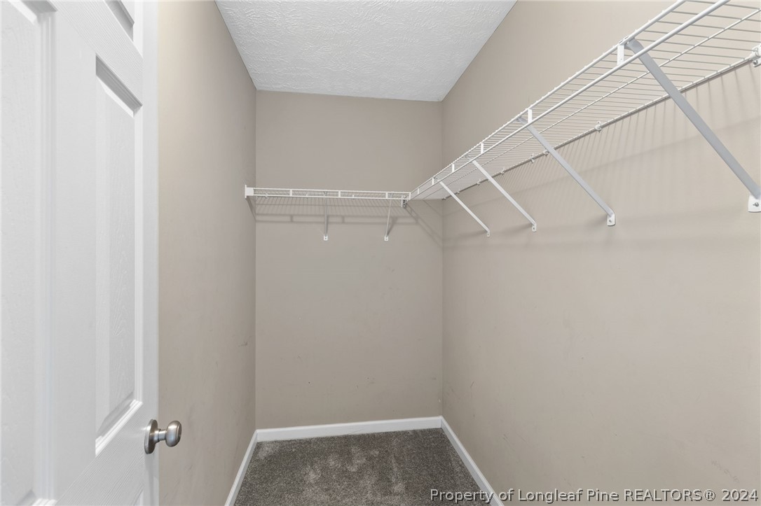 519 Cape Fear Road Raeford, NC 28376 - Photo 32 of 39 a view of a room with racks on the wall
