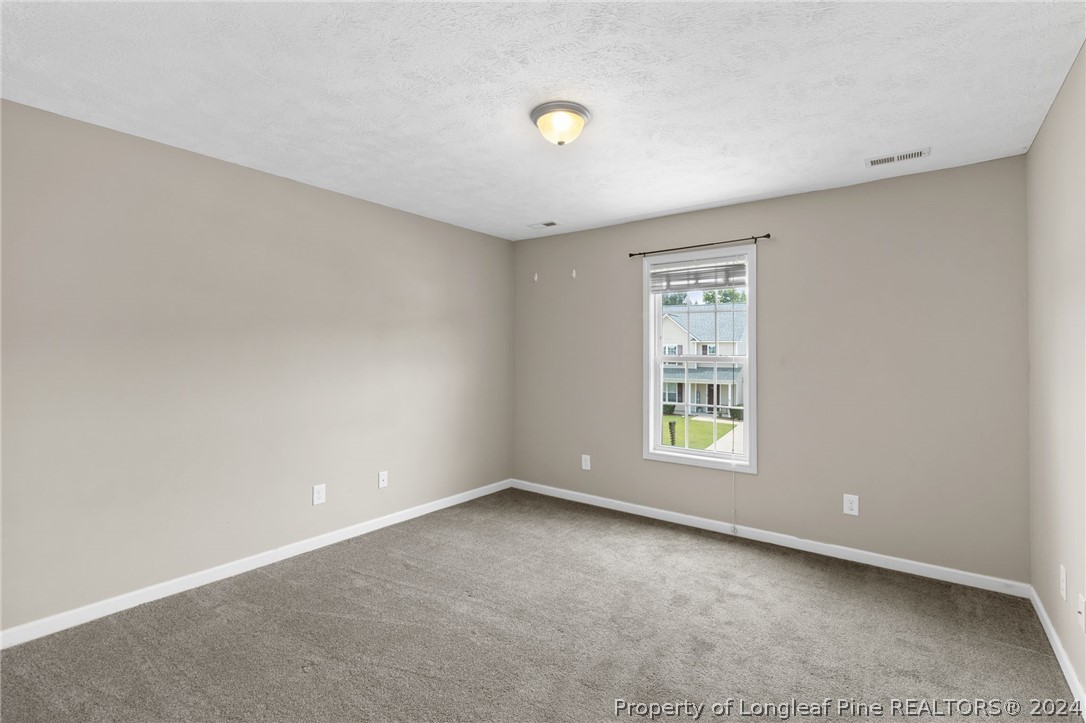 519 Cape Fear Road Raeford, NC 28376 - Photo 33 of 39 a view of an empty room with a window