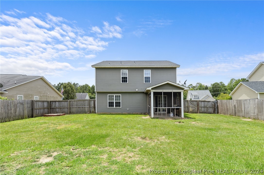 519 Cape Fear Road Raeford, NC 28376 - Photo 38 of 39 a front view of a house with a yard