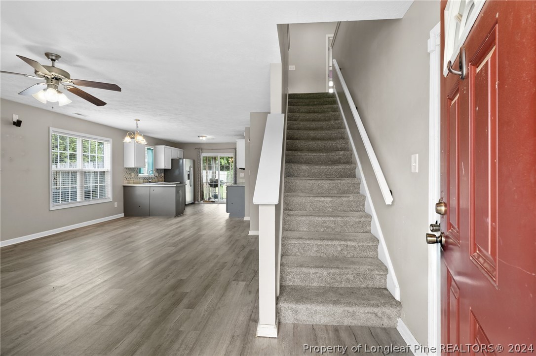 519 Cape Fear Road Raeford, NC 28376 - Photo 4 of 39 a view of entryway and hall with wooden floor