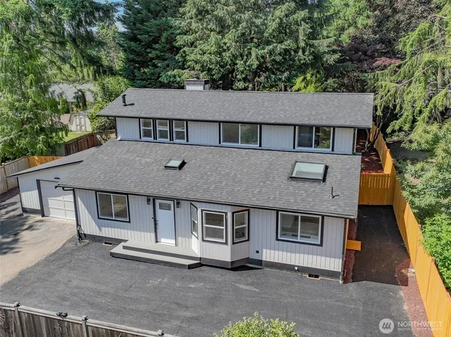 a bathroom with a bathtub and shower