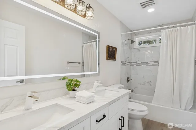 a view of a livingroom with a bathroom