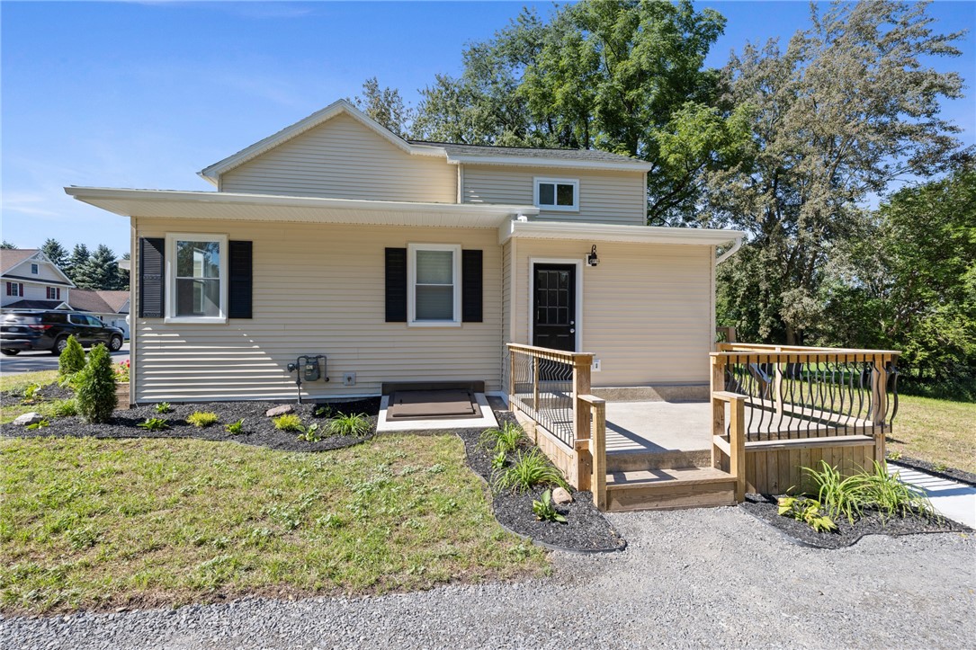 Side entry and walk-out Bilco doors to basement!