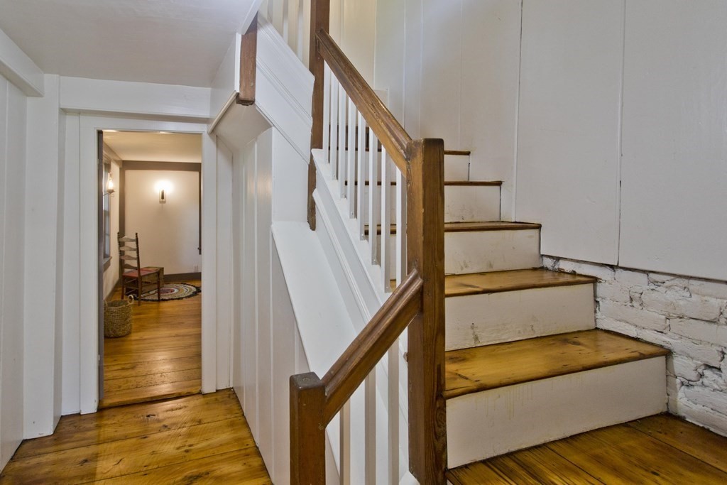 621 Amherst Road Sunderland, MA 01375 - Photo 19 of 42 a view of livingroom with furniture and staircase