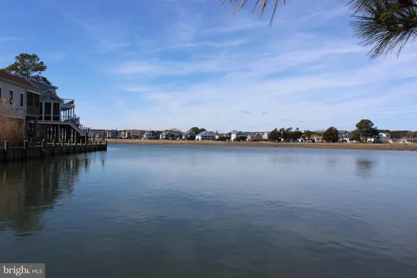 a view of a lake with houses