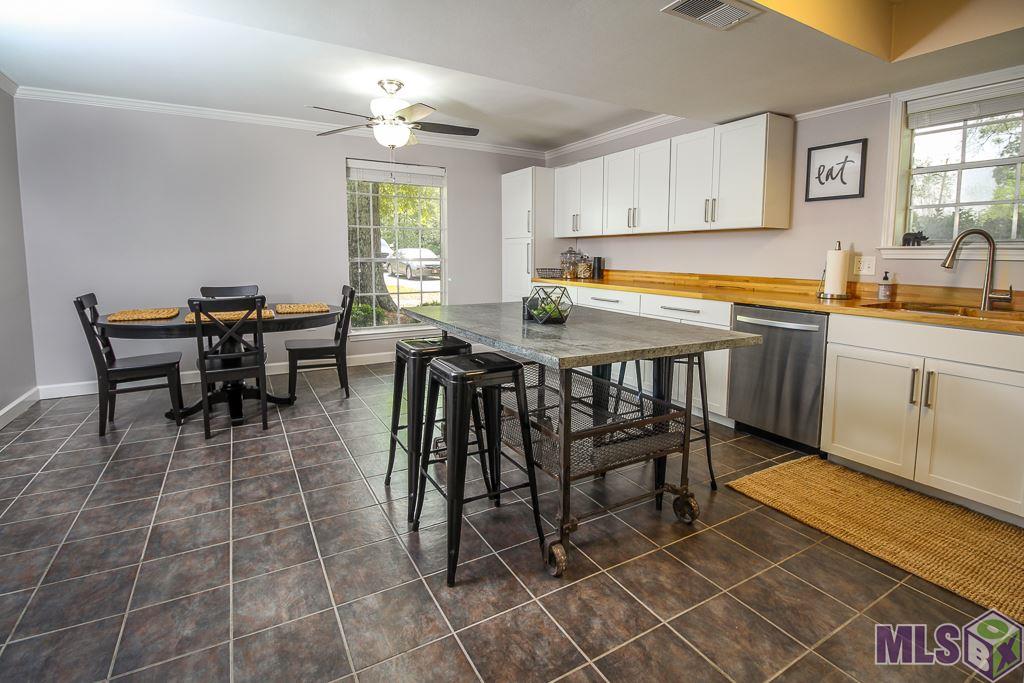 10249 Joor Road Baton Rouge, LA 70818 - Photo 12 of 25 Kitchen is Open to the Breakfast / Dining Area