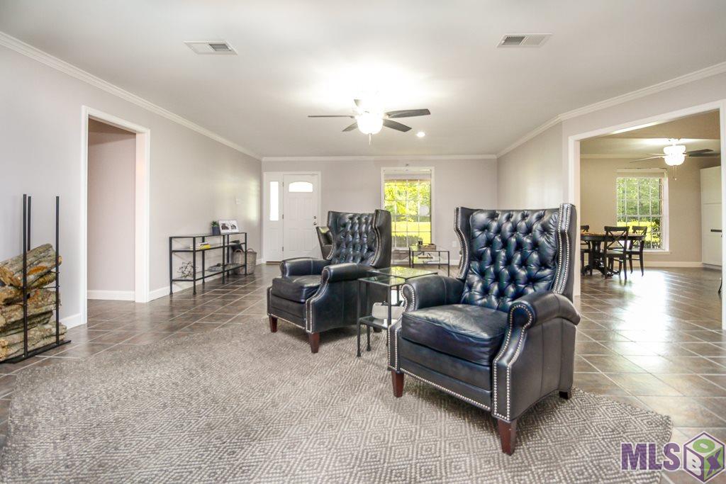 10249 Joor Road Baton Rouge, LA 70818 - Photo 15 of 25 Living Room is Open to the Kitchen/Dining Area