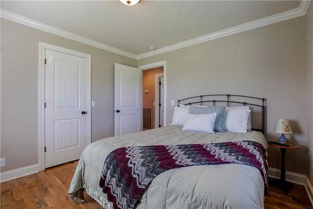 4305 Cedar Grove Road Murfreesboro, TN 37127 - Photo 16 of 20 Located on the other end of the home, you will find two great Bedrooms, both with hardwood floors. One has a walk-in closet and one has two closets. Bedroom #2 is shown and Bedroom #3 is similar! All rooms in this home offer versatility in use!