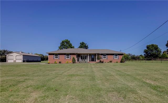 4305 Cedar Grove Road Murfreesboro, TN 37127 - Photo 20 of 20 A view of the front of the home with 4-board fence along the front of the property (new in 2013). The concrete drive is impressive & expansive and built to support RV & trailer weights! Come see this lovely property for yourself! It can be YOURS!