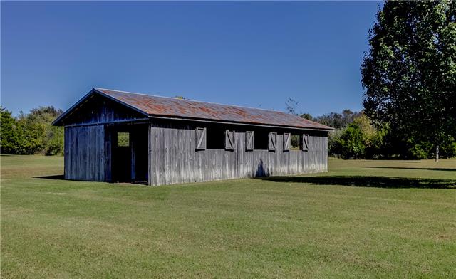 4305 Cedar Grove Road Murfreesboro, TN 37127 - Photo 4 of 20 Love horses? This 20x40 run-through barn has 2 stalls and tack room (could be 3rd stall) - complete with electricity! Plenty of room on 6.35 ac for the horses to roam - property has barbed wire fence, just needs cross-fence by the barn!