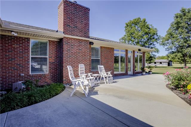 4305 Cedar Grove Road Murfreesboro, TN 37127 - Photo 6 of 20 A closer look at the back of the home which has huge patio area great for relaxing, grilling & entertaining; also equipped with speakers! Access to patio through Kitchen or Sunroom!