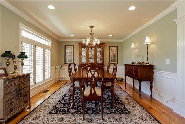 4305 Cedar Grove Road Murfreesboro, TN 37127 - Photo 8 of 20 The Dining Room is large enough to accommodate the entire family and more with hardwood floor and crown moulding (there is crown moulding and upgraded trim throughout the home)!