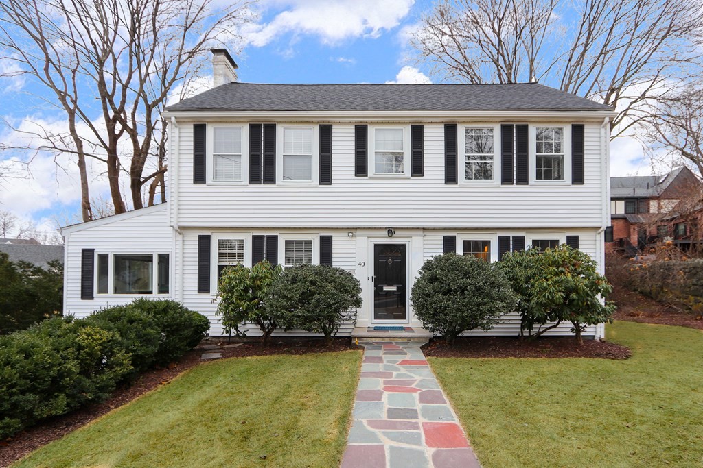 40 Whittier Road Newton, MA 02460 - Photo 1 of 20 a front view of a house with garden