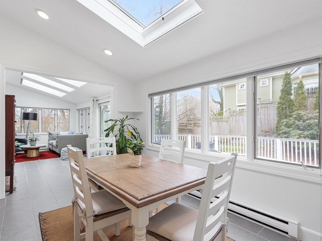 40 Whittier Road Newton, MA 02460 - Photo 8 of 20 a view of a dining room with furniture window and outside view