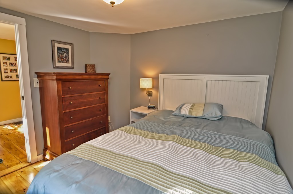 55 Evergreen Road Norton, MA 02766 - Photo 14 of 21 a bedroom with a bed and a dresser