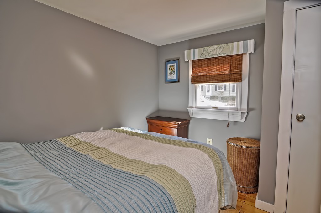 55 Evergreen Road Norton, MA 02766 - Photo 15 of 21 a bedroom with a bed and a window