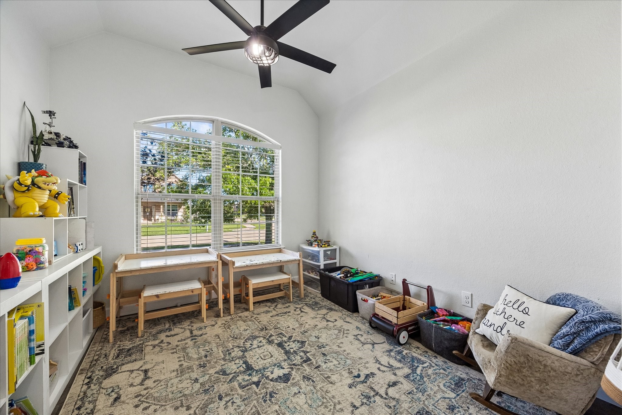 326 Ralston Ranch Court Richmond, TX 77469 - Photo 17 of 28 Bright and versatile third bedroom featuring a distinctive arched window -ideal for use as a home office or tailored to your personal needs.