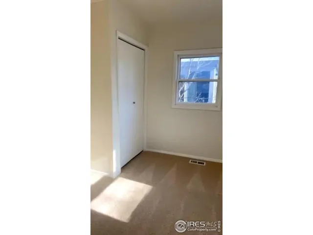 a view of an empty room with window