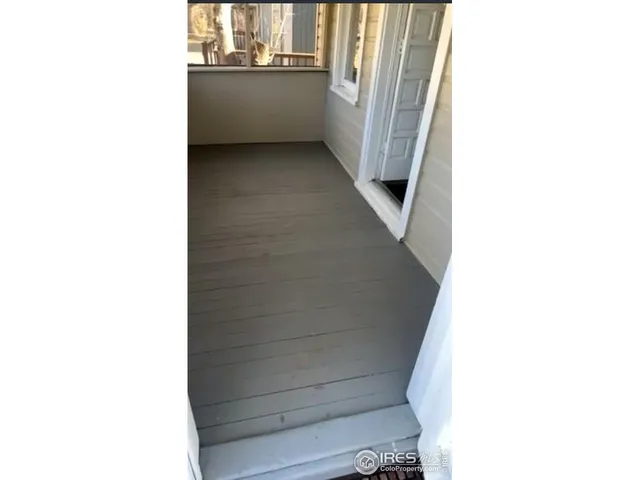 a view of a room with a window