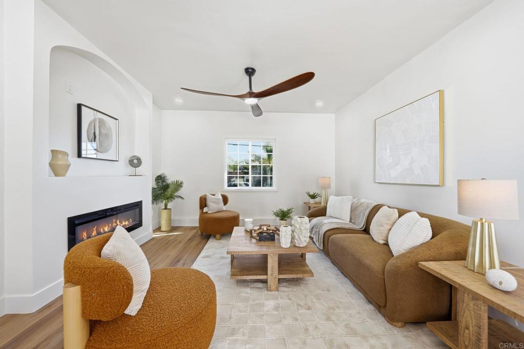 4920 Elsa Road San Diego, CA 92120 - Photo 14 of 46 a living room with furniture and a fireplace