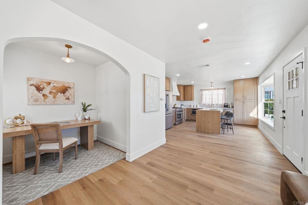 4920 Elsa Road San Diego, CA 92120 - Photo 17 of 46 a living room with furniture and kitchen view
