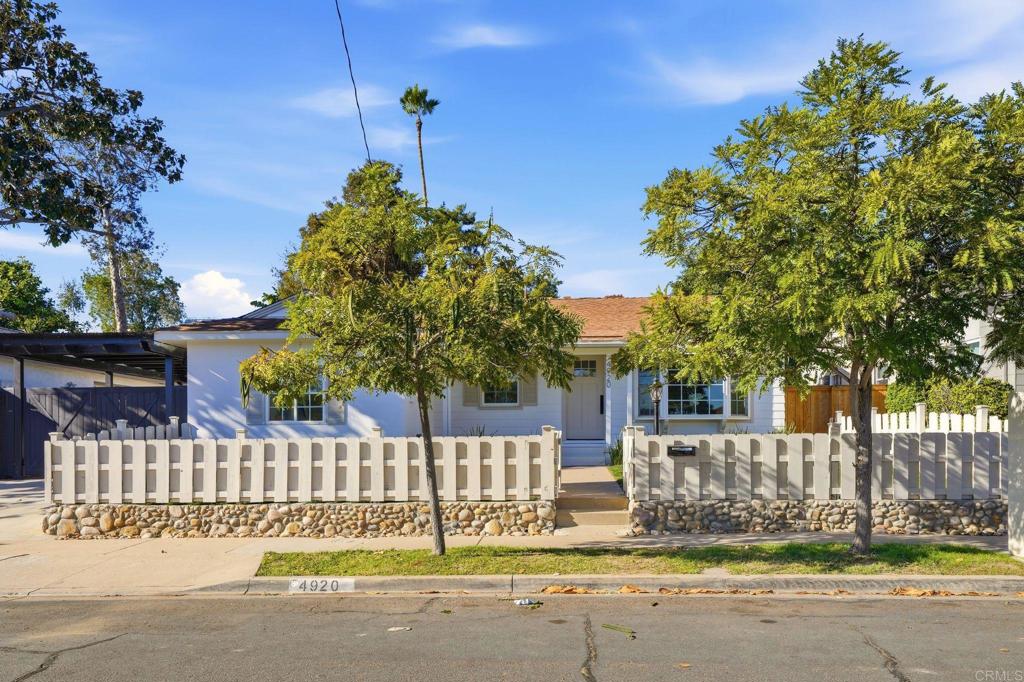 4920 Elsa Road San Diego, CA 92120 - Photo 2 of 46 a front view of a house having yard