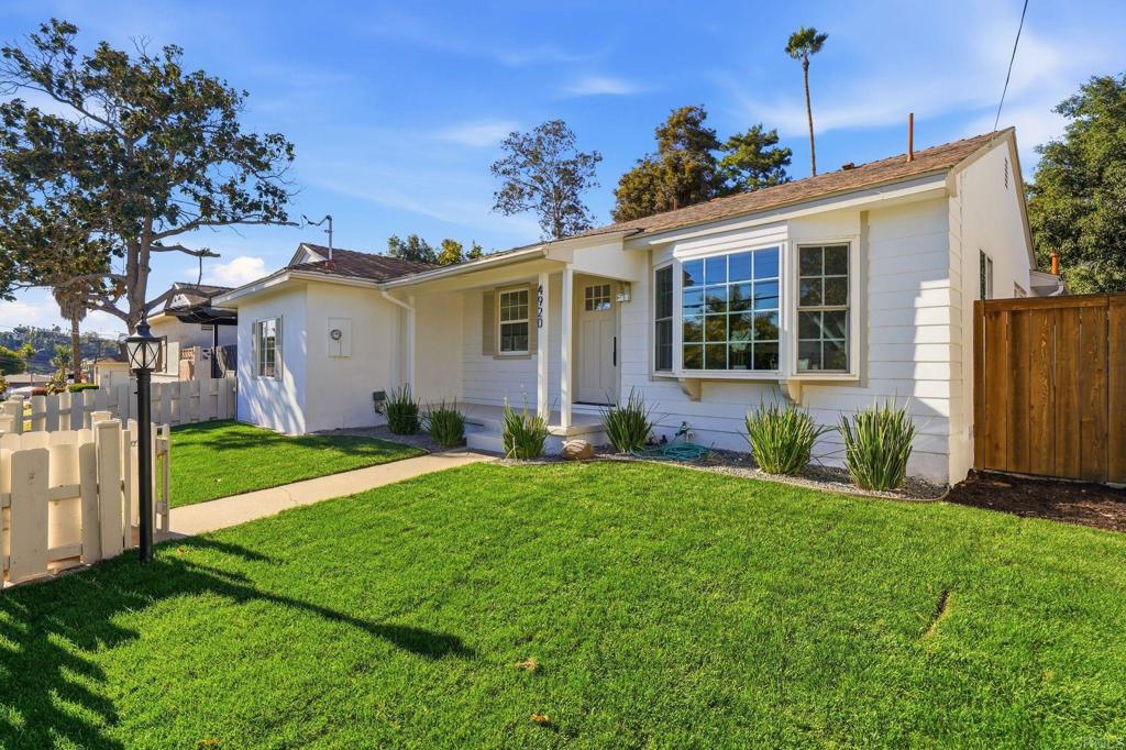 4920 Elsa Road San Diego, CA 92120 - Photo 36 of 46 a view of a house with a garden