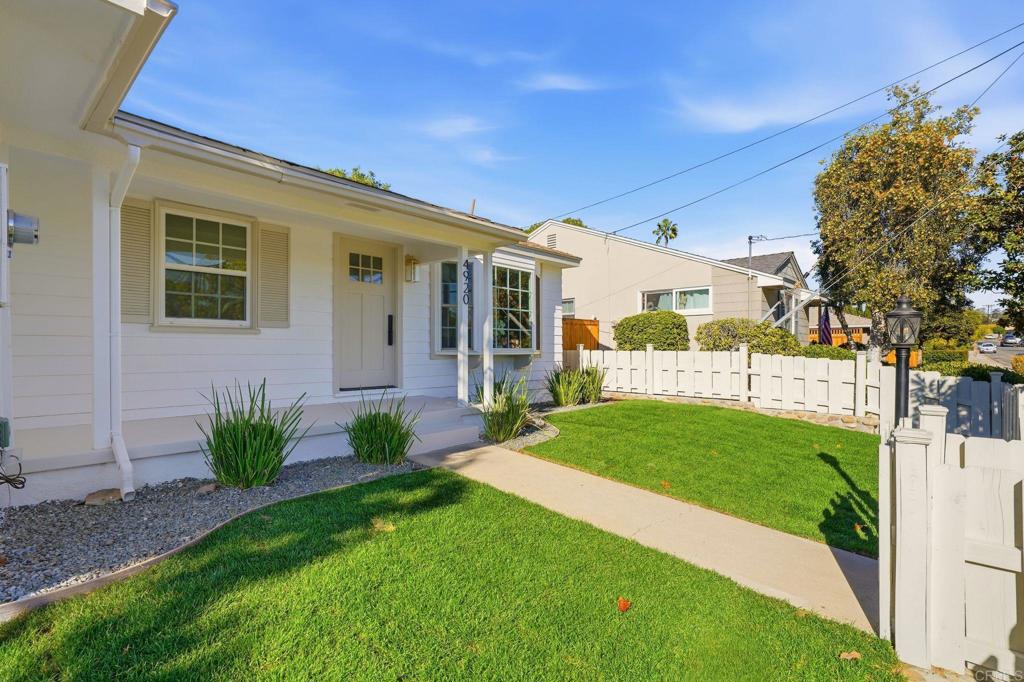 4920 Elsa Road San Diego, CA 92120 - Photo 37 of 46 a view of a house with a garden