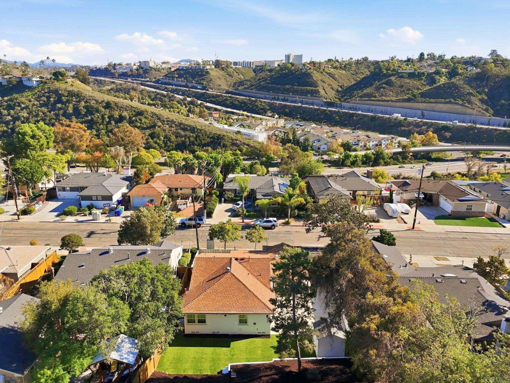 4920 Elsa Road San Diego, CA 92120 - Photo 44 of 46 an aerial view of residential houses with outdoor space