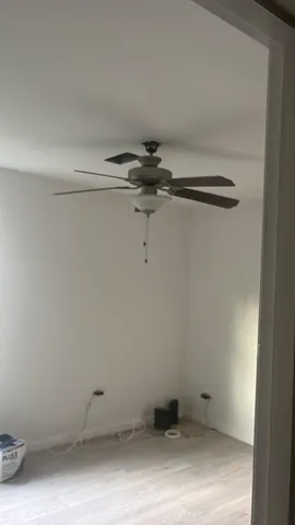 a view of room with racks on the wall