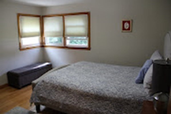 100 Bellwood Road Springfield, MA 01119 - Photo 8 of 24 a bedroom with a bed and a mirror