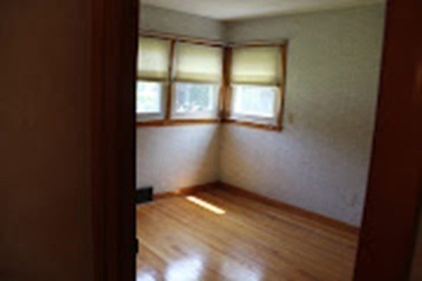 100 Bellwood Road Springfield, MA 01119 - Photo 10 of 24 wooden floor in an empty room with a window