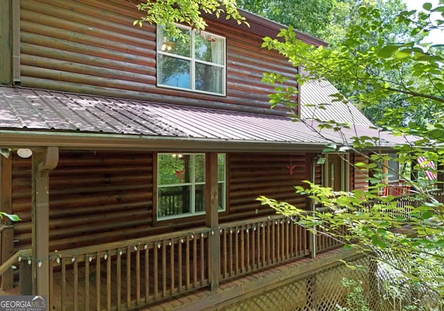 a view of a house with a window and wooden floor