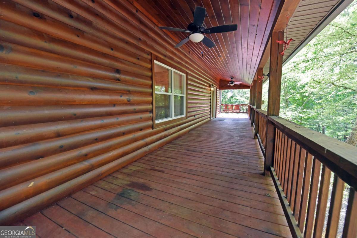 3373 Hardscrabble Road Mineral Bluff, GA 30559 - Photo 11 of 50 a view of a balcony with wooden floor