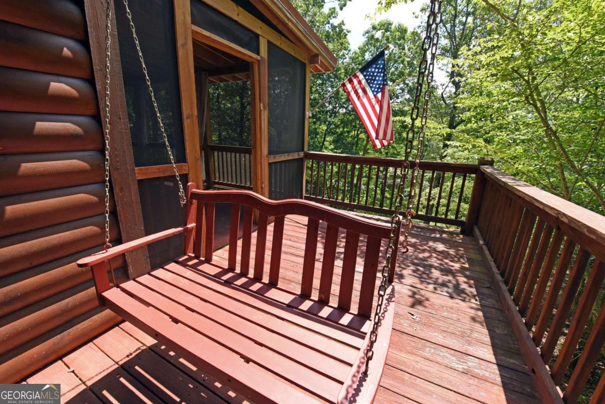 3373 Hardscrabble Road Mineral Bluff, GA 30559 - Photo 13 of 50 a view of a balcony with wooden floor
