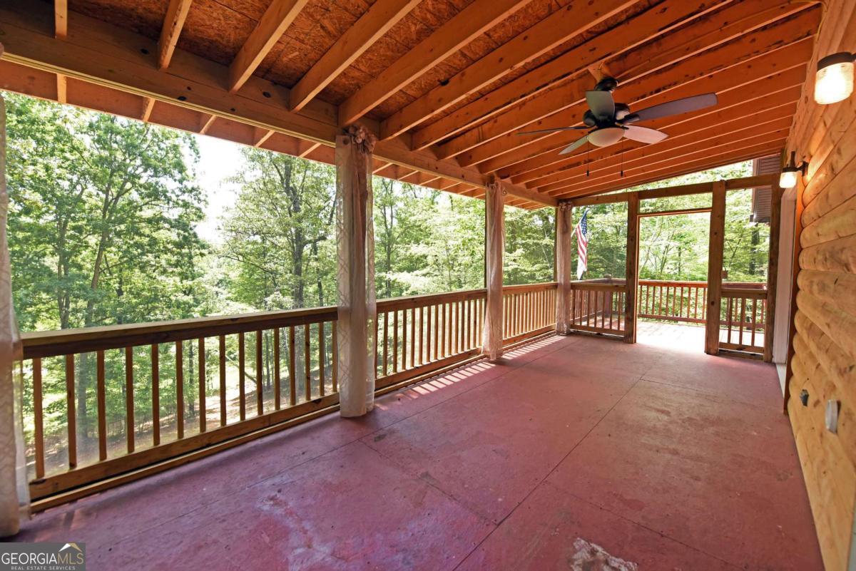 3373 Hardscrabble Road Mineral Bluff, GA 30559 - Photo 19 of 50 a view of a porch with wooden floor